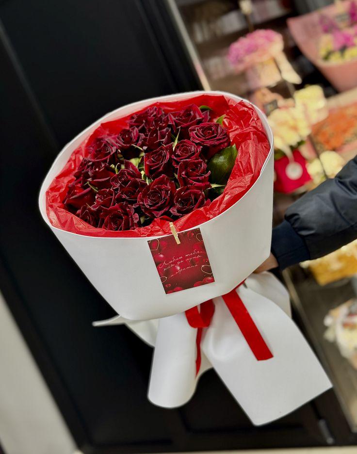 Professional floral arrangement in modern corporate setting